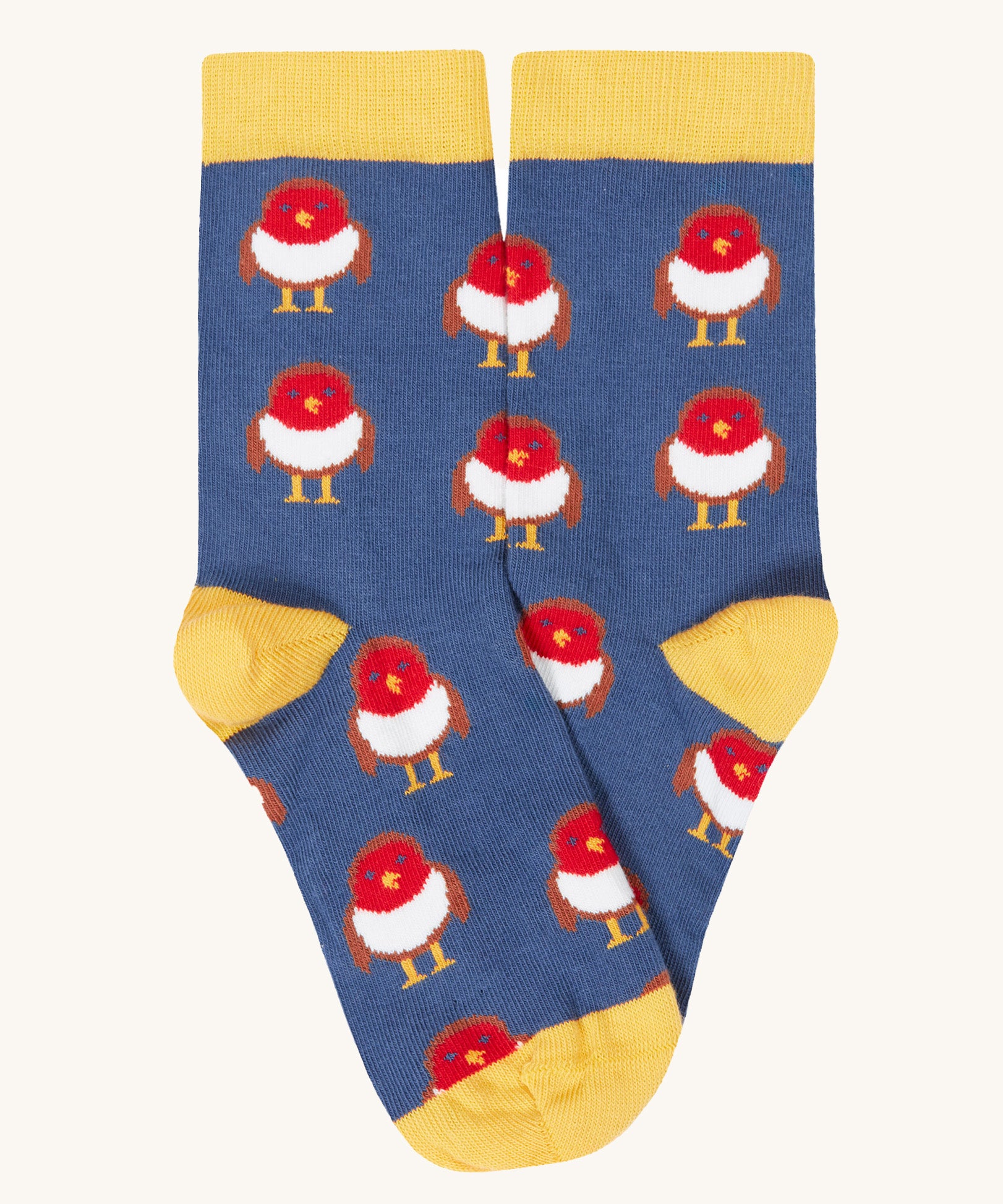 A close up of the blue and yellow with a cute robin design stock from the Frugi rock my socks 3 in festive multipack available at Babipur. 