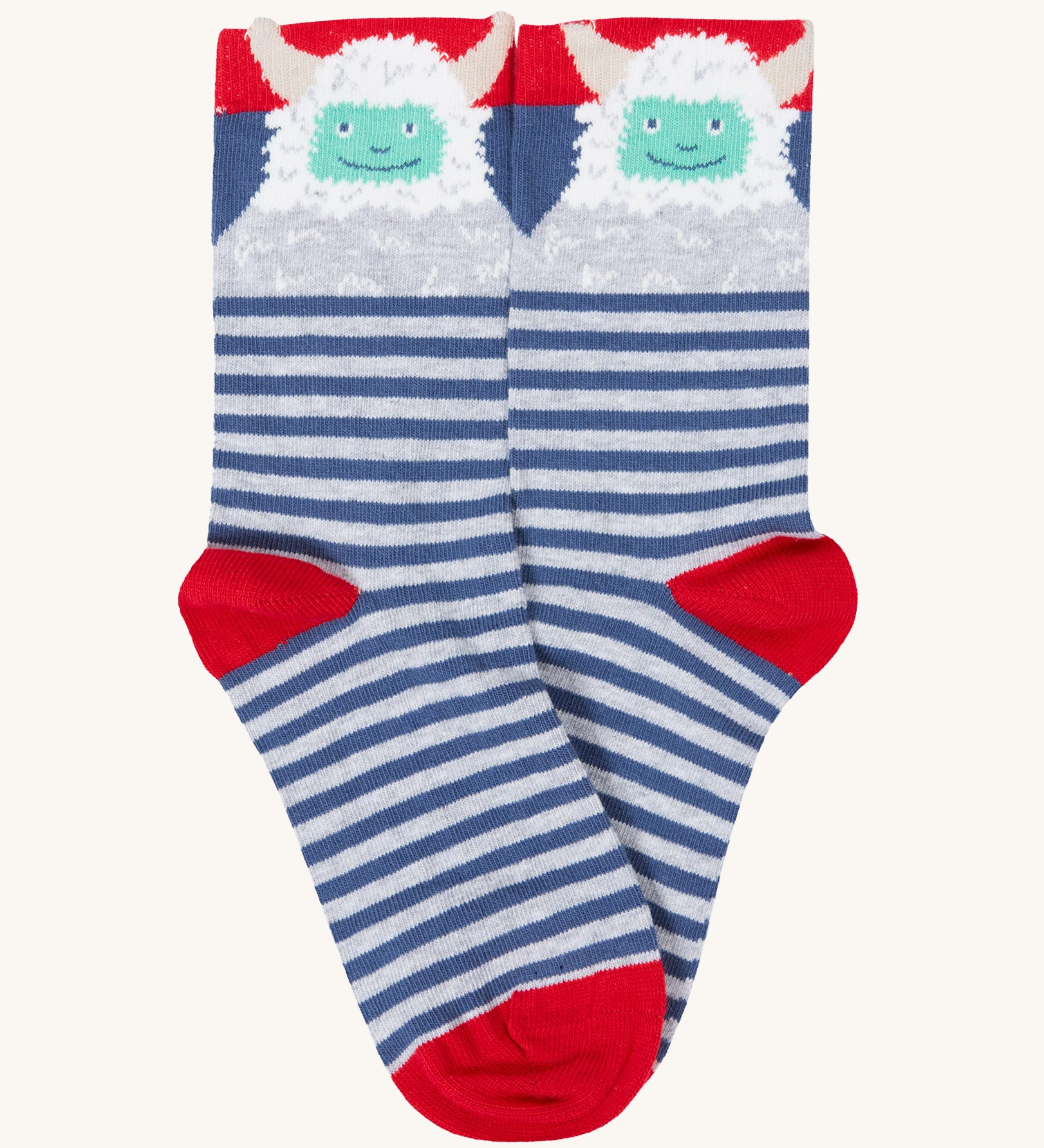 A close up of the blue and grey striped with yeti stock from the Frugi rock my socks 3 in festive multipack available at Babipur. 