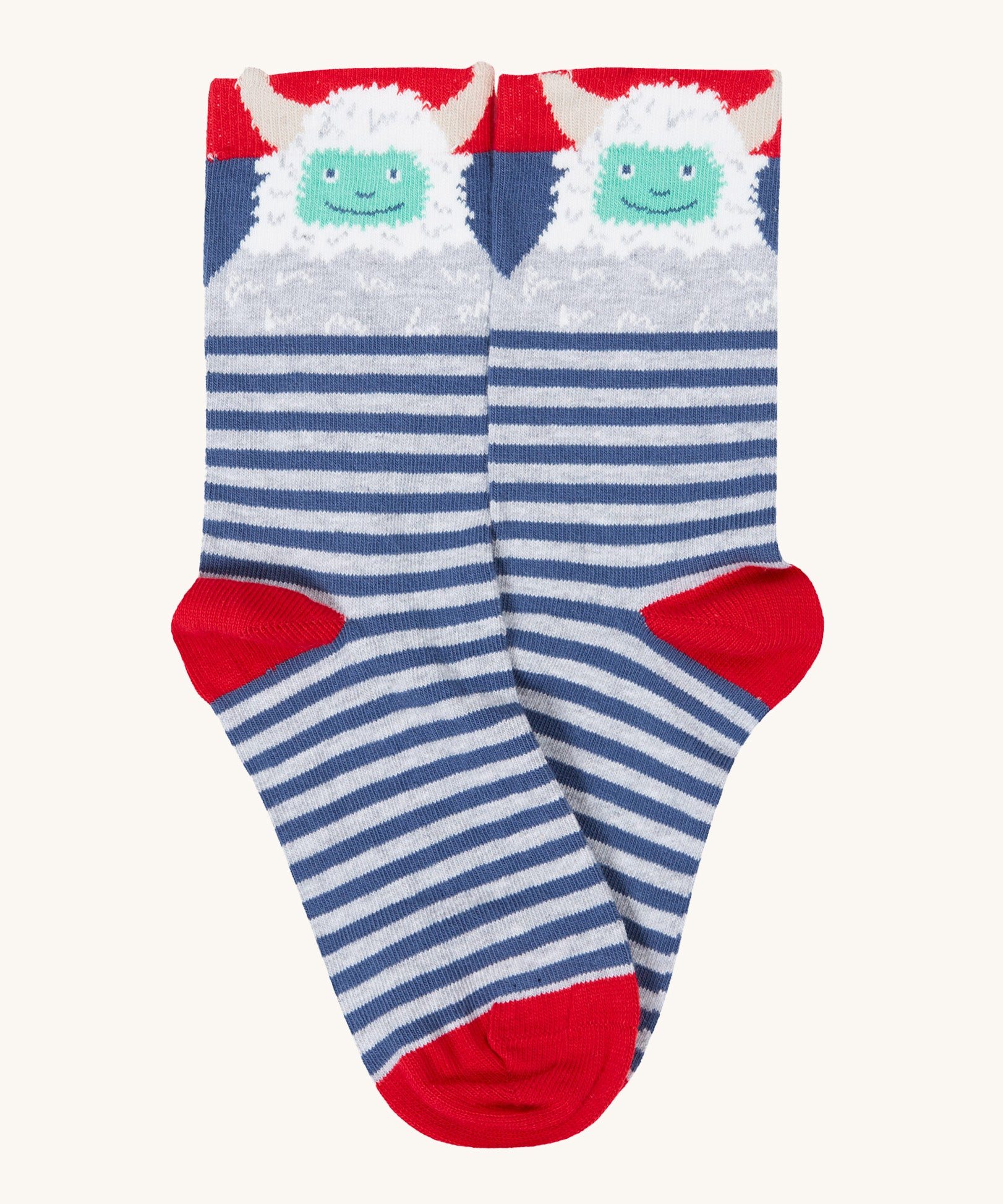 A close up of the blue and grey striped with yeti stock from the Frugi rock my socks 3 in festive multipack available at Babipur. 