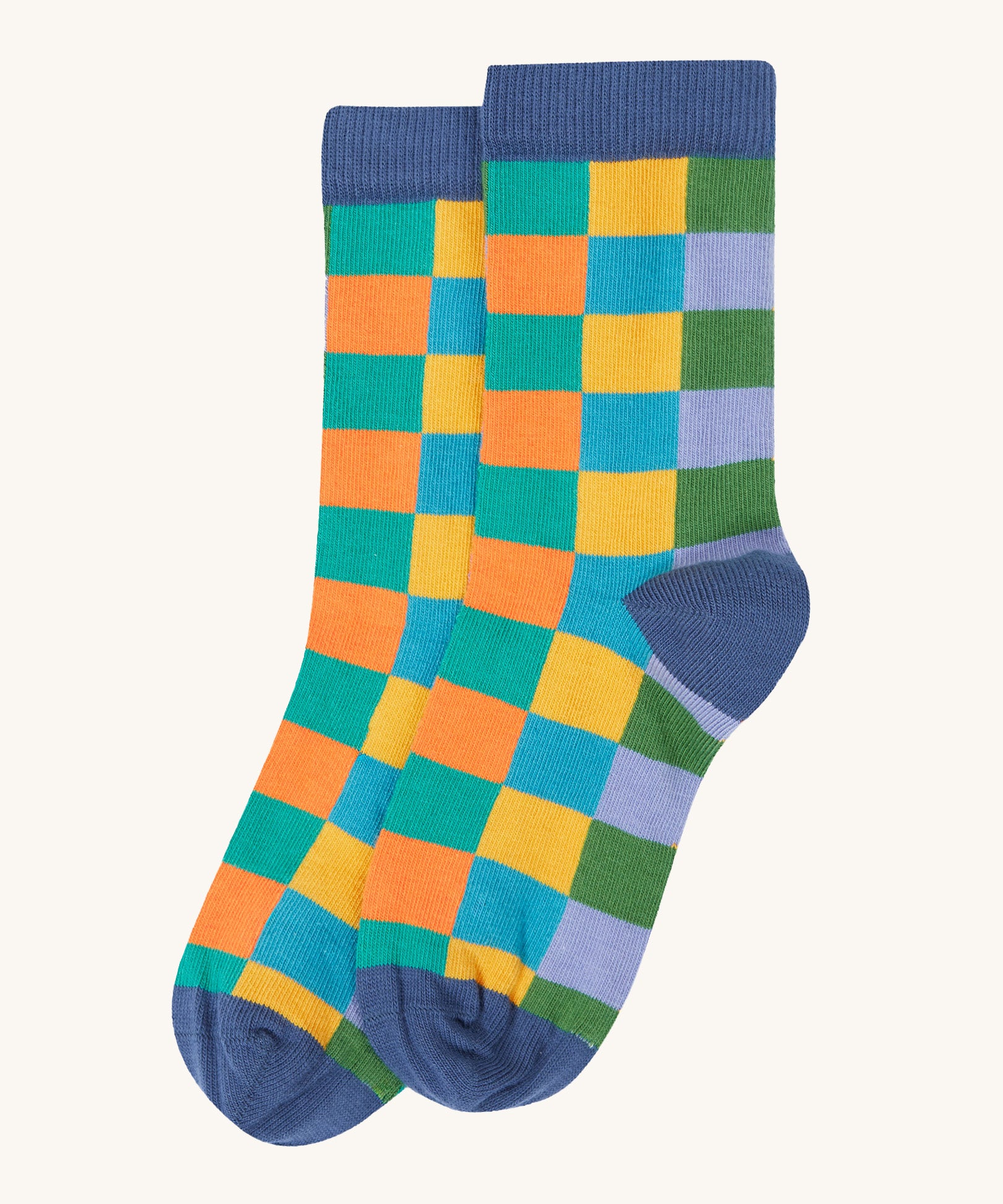 A close up of the autumn coloured inspired checkered design sock from the Frugi rock my socks 3 pack in stay wild available at Babipur. 