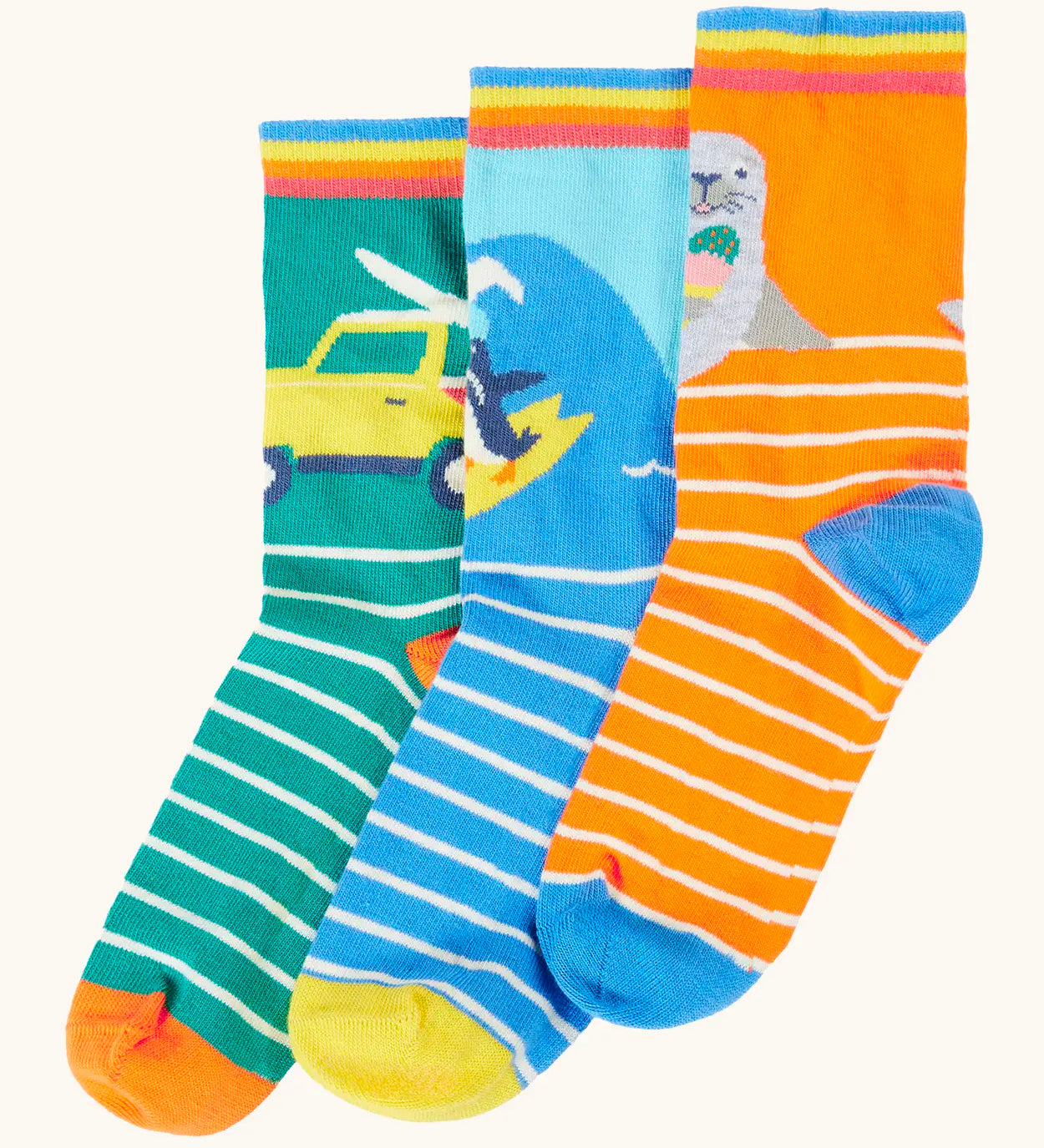 Frugi 100% organic cotton rock my socks 3 pack in bright colours with ocean and surfing inspired designs. 