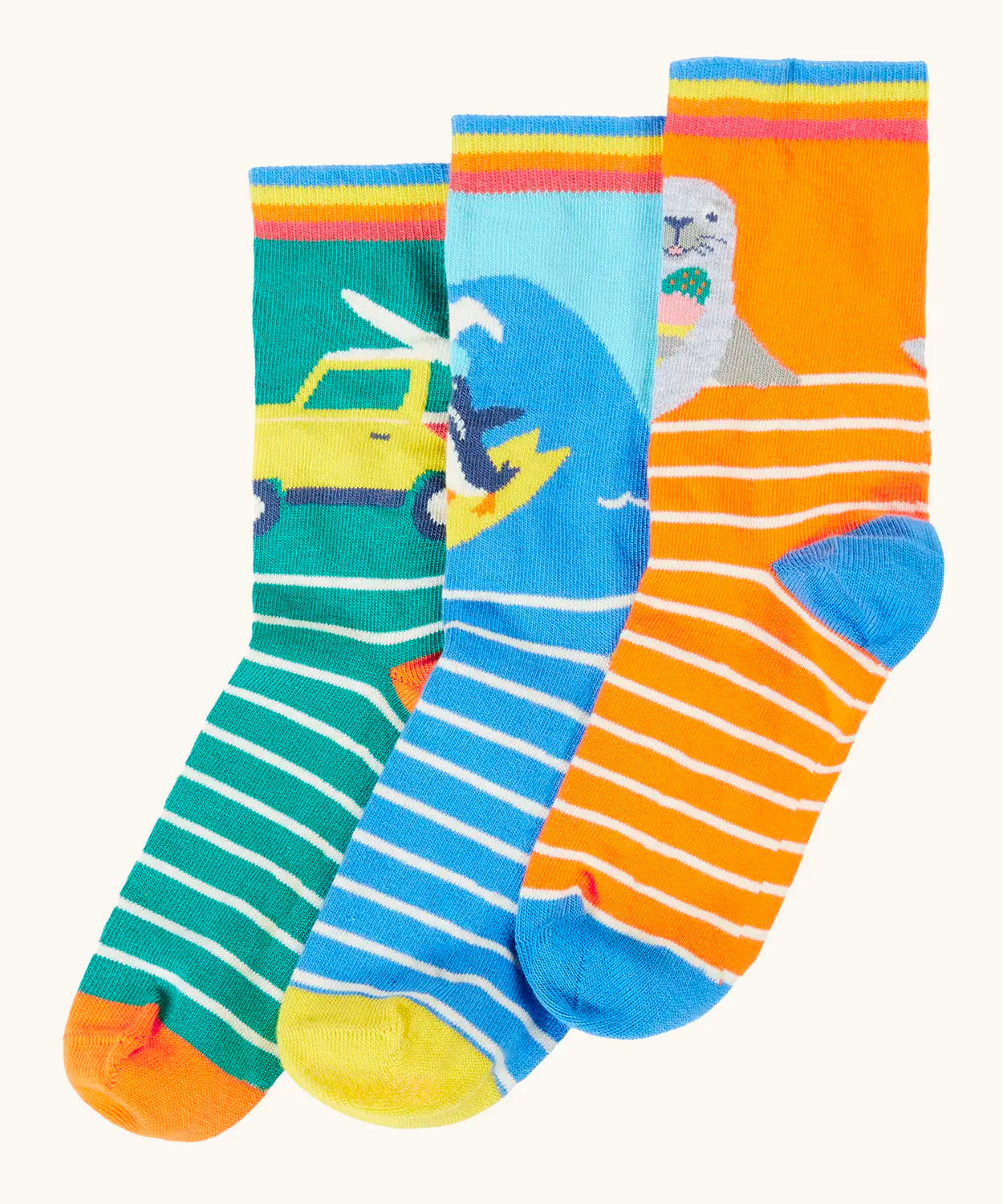 Frugi 100% organic cotton rock my socks 3 pack in bright colours with ocean and surfing inspired designs. 