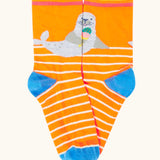 Frugi 100% organic cotton orange sock with white stripes and a seal design from the surf rock my socks mutipack