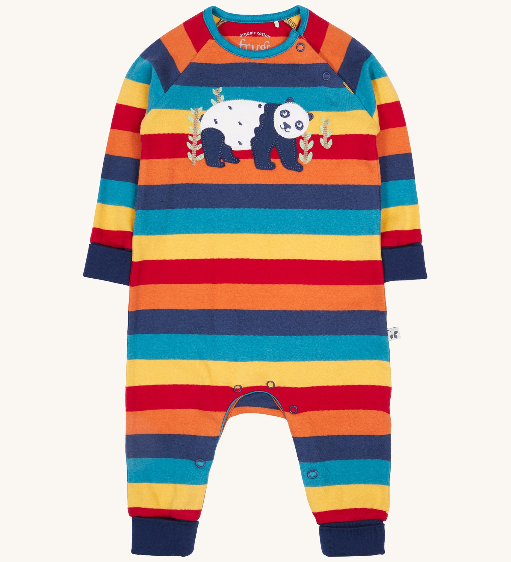Frugi rowan romper in big rainbow stripe / panda available at Babipur. A GOTS organic cotton all in one in a bright rainbow inspired striped design with  a playful applique on the front. Features a popper fastener on the shoulder.