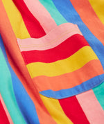 Close up of the pouch pocket on the Frugi 100% organic cotton rainbow striped Samantha Summer dress 