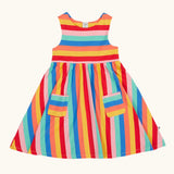 Frugi 100% organic cotton Samantha Summer dress in a rainbow striped design showing 2 small pouch pockets on the skirt