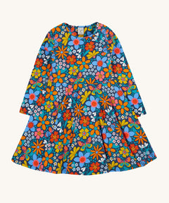 Frugi sofia skater dress in navy / retro flowers available at Babipur. A GOTS organic cotton skater dress in navy with a bright retro floral design. 