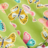 Close up of the Frugi 100% organic cotton spring skater dress in green showing the repeating colourful butterfly print.