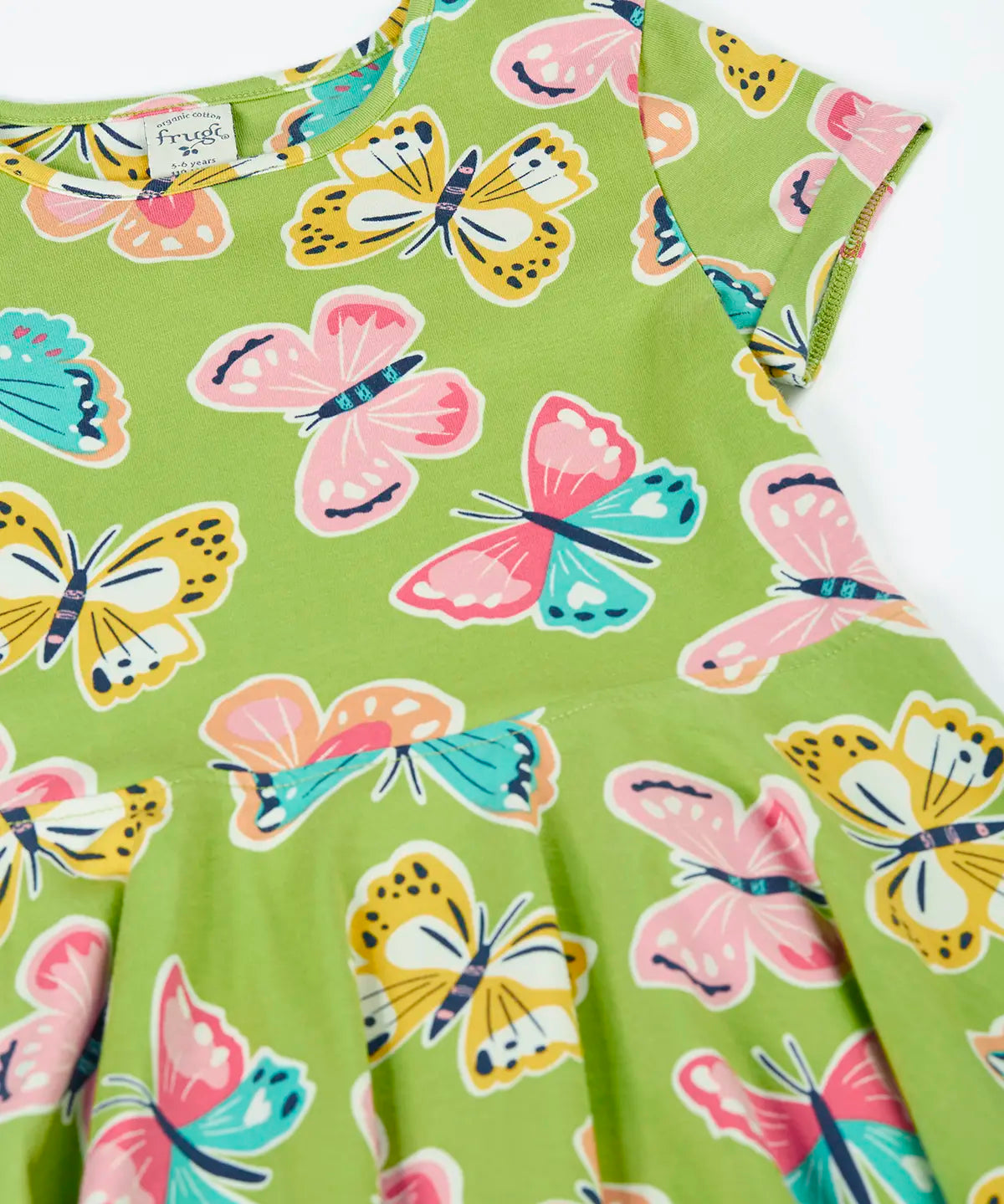 Frugi 100% organic cotton spring skater dress in green laid flat showing the repeating colourful butterfly print.