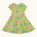 Frugi 100% organic cotton spring skater dress in green with a repeating colourful butterfly print.