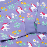 A close up of the wrist cuffs on the Frugi superb sweatshirt in unicorn floral available at Babipur. A soft GOTS organic cotton sweatshirt in lilac with a unicorn and floral print all over.