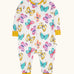 Frugi 100% organic cotton Zelah all in one in white with a repeating butterfly print. Showing full length front zip