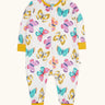 Frugi 100% organic cotton Zelah all in one in white with a repeating butterfly print. Showing full length front zip