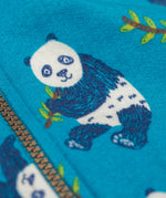 A close up of a panda fearured on teh print on the Frugi snuggle suit in panda pals available at Babipur. A GOTS organic cotton light blue hooded all in one with a playful panda design. Features a full length zip fastener.