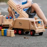 Fagus garbage tipper, a wooden rubbish van with working tipping mechanism, four peg dolls and wheelie bins.