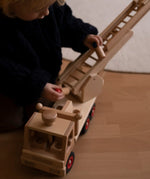 Fagus fire engine toy, beautifully crafted from wood with an extendable rotating 3-piece ladder.