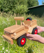 Fagus Wooden Toy Jeep with working steering, a spare wheel on the back.