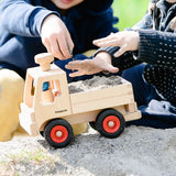 Fagus unimog, kids wooden toy truck with tow bar, working steering and rubber wheels, played with by kids outside.