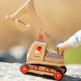 Fagus wooden excavator toy, handmade with grippy rubber tracks, an adjustable scoop and two peg dolls for small world play.
