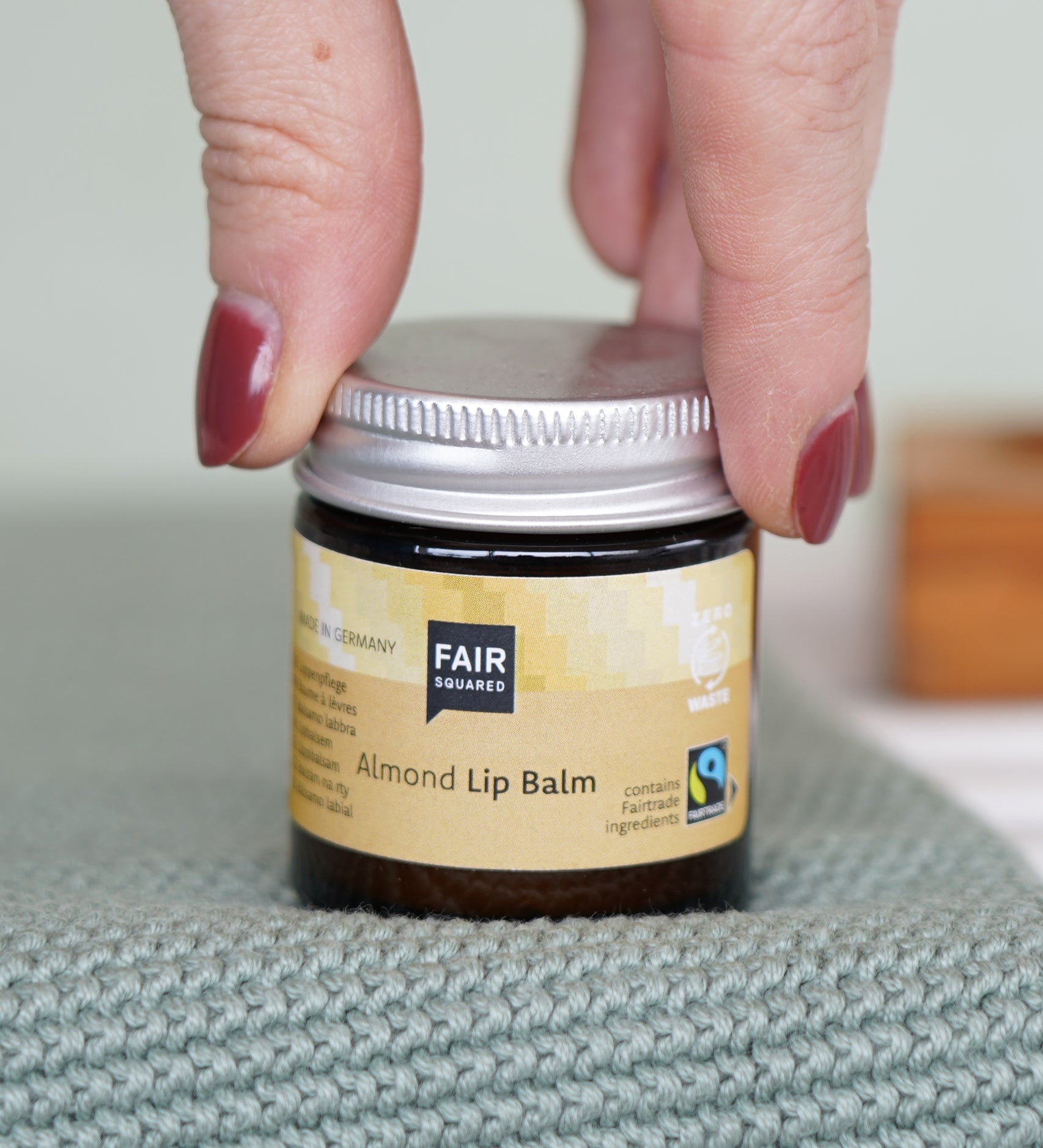 Glass jar of cruelty free Fair Squared Fairtrade Almond Lip Balm, for sale at Babipur.