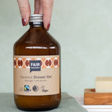 Plastic-free Fairtrade Coconut Shower Gel 500ml in a bathroom, by Fair Squared, available to buy at Babipur.
