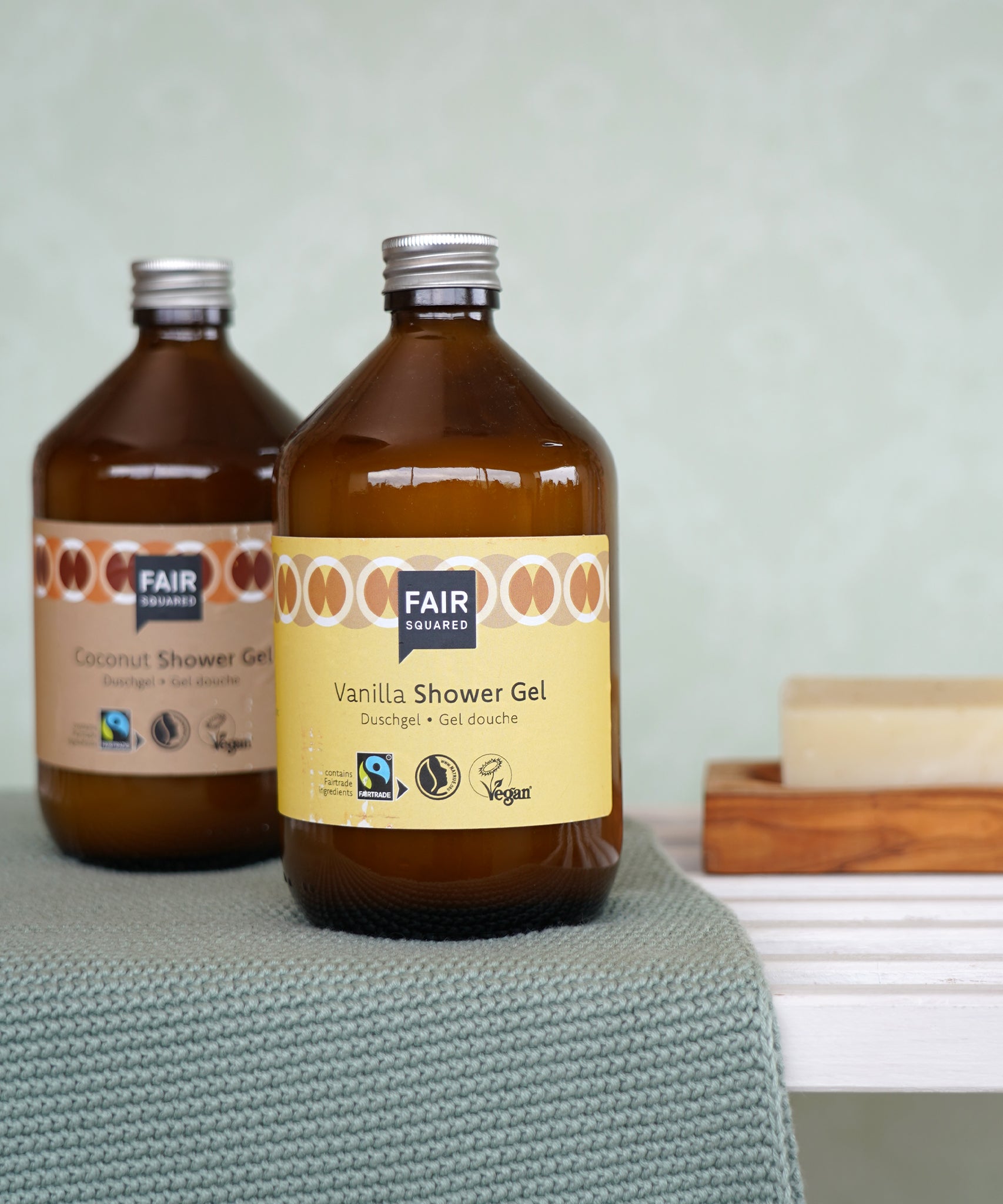 Plastic-free Fairtrade Vanilla Shower Gel 500ml in a bathroom, by Fair Squared, available to buy at Babipur.