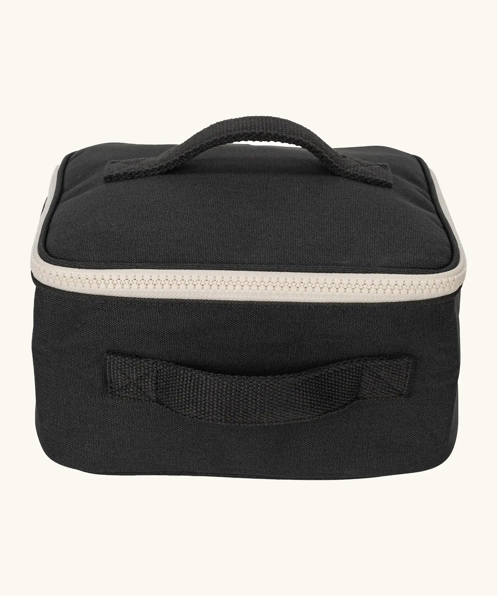 Fluf GOTS organic cotton square lunch bag in carbon black with a white zip detail. Features a carry handle on the top and side