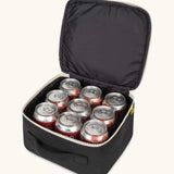 An open carbon black Fluf square lunch bag showing drink cans standing inside. Lunch bag features a a rinseable, food-safe lining