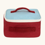 Fluf GOTS organic cotton square lunch bag in red with a blue top panel and white zip detail. Features a red carry handle on the top and side