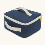 Side of a Fluf GOTS organic cotton square lunch bag in navy showing the white zip detail and carry handles