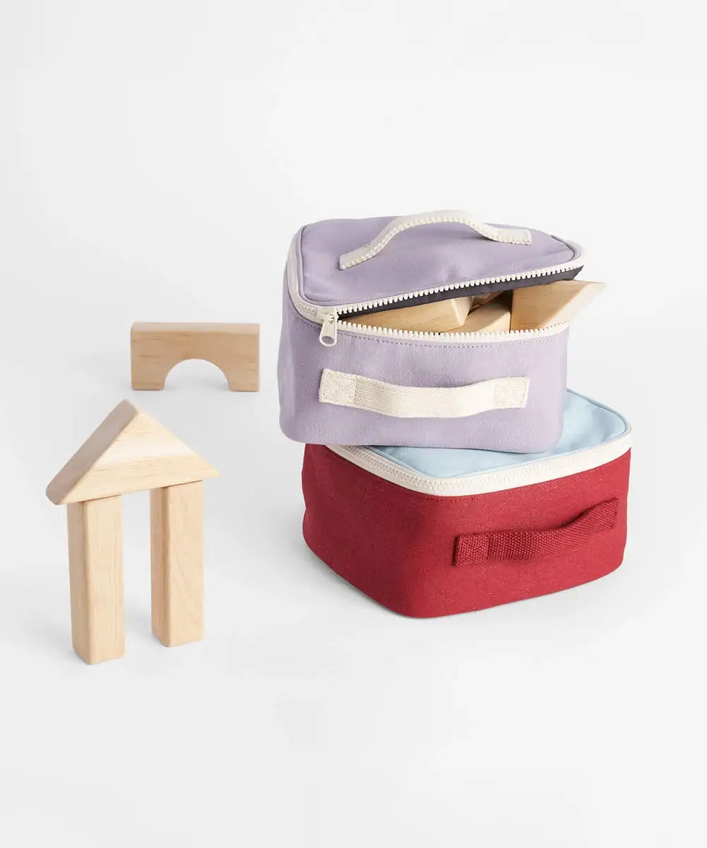 Wooden blocks packed inside GOTS organic cotton  Fluf square lunch bag