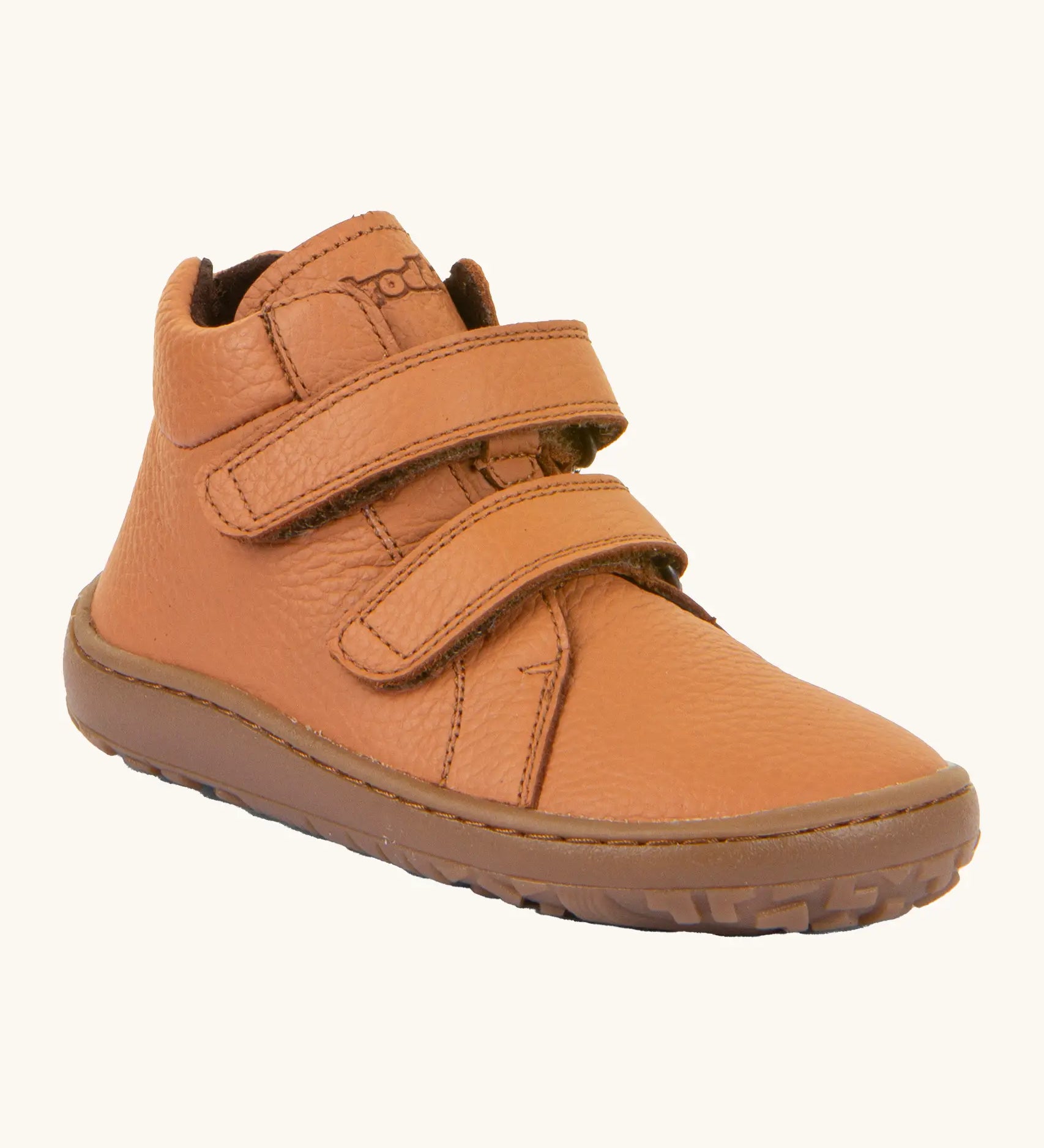Rusty brown Froddo natural leather kids barefoot shoe with a padded ankle support, velcro straps, flexible rubber sole and zero drop profile