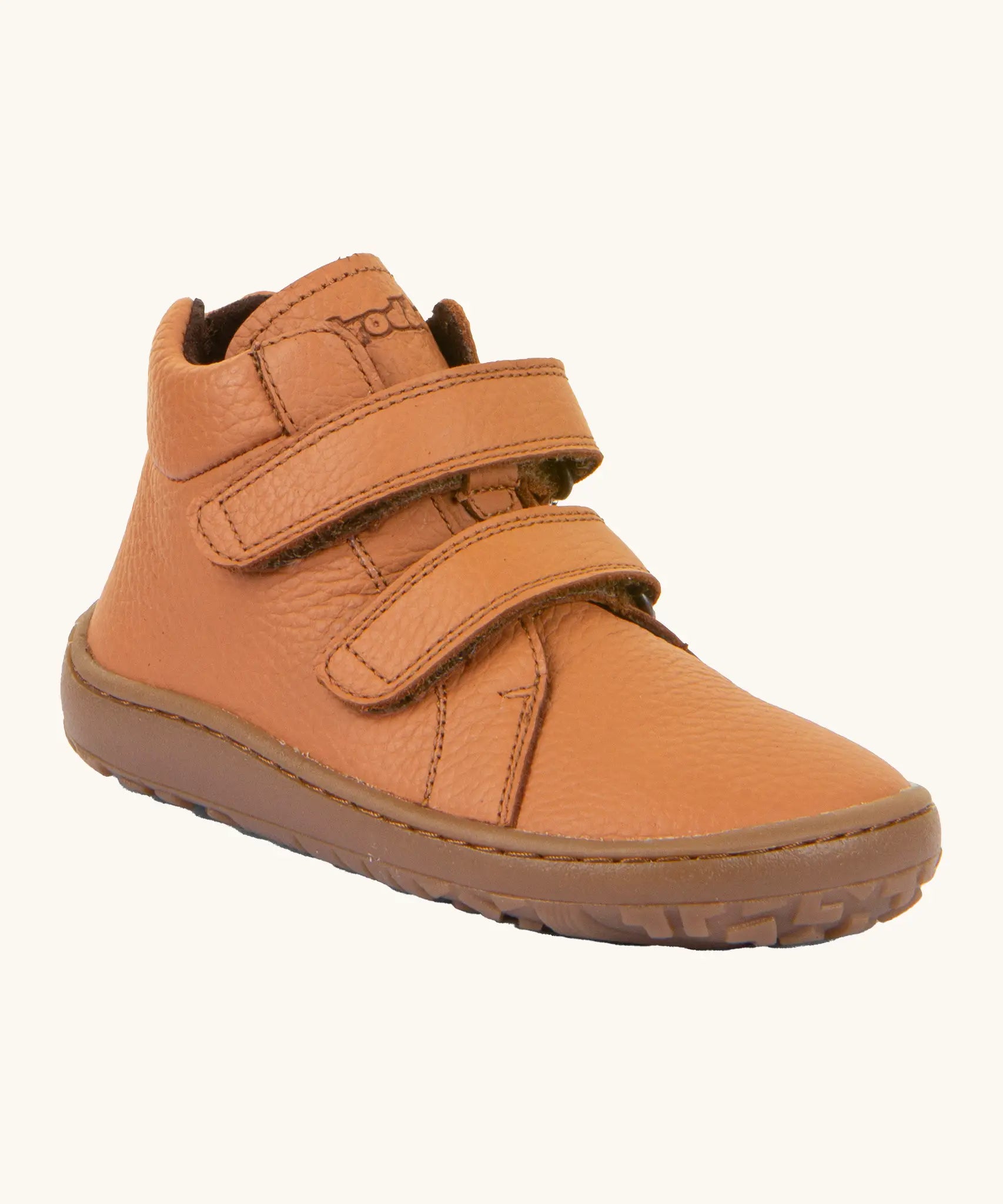 Rusty brown Froddo natural leather kids barefoot shoe with a padded ankle support, velcro straps, flexible rubber sole and zero drop profile