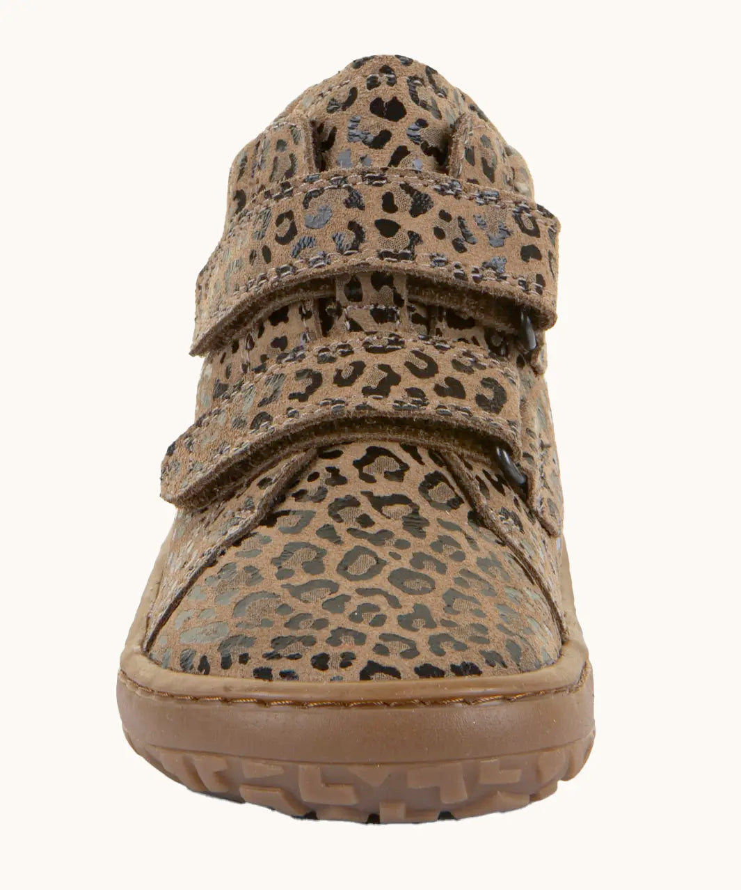 Front of the Froddo natural leather kids barefoot shoe in leopard print showing the velcro straps and flexible sole. Shoe has a wide toe box and zero drop profile