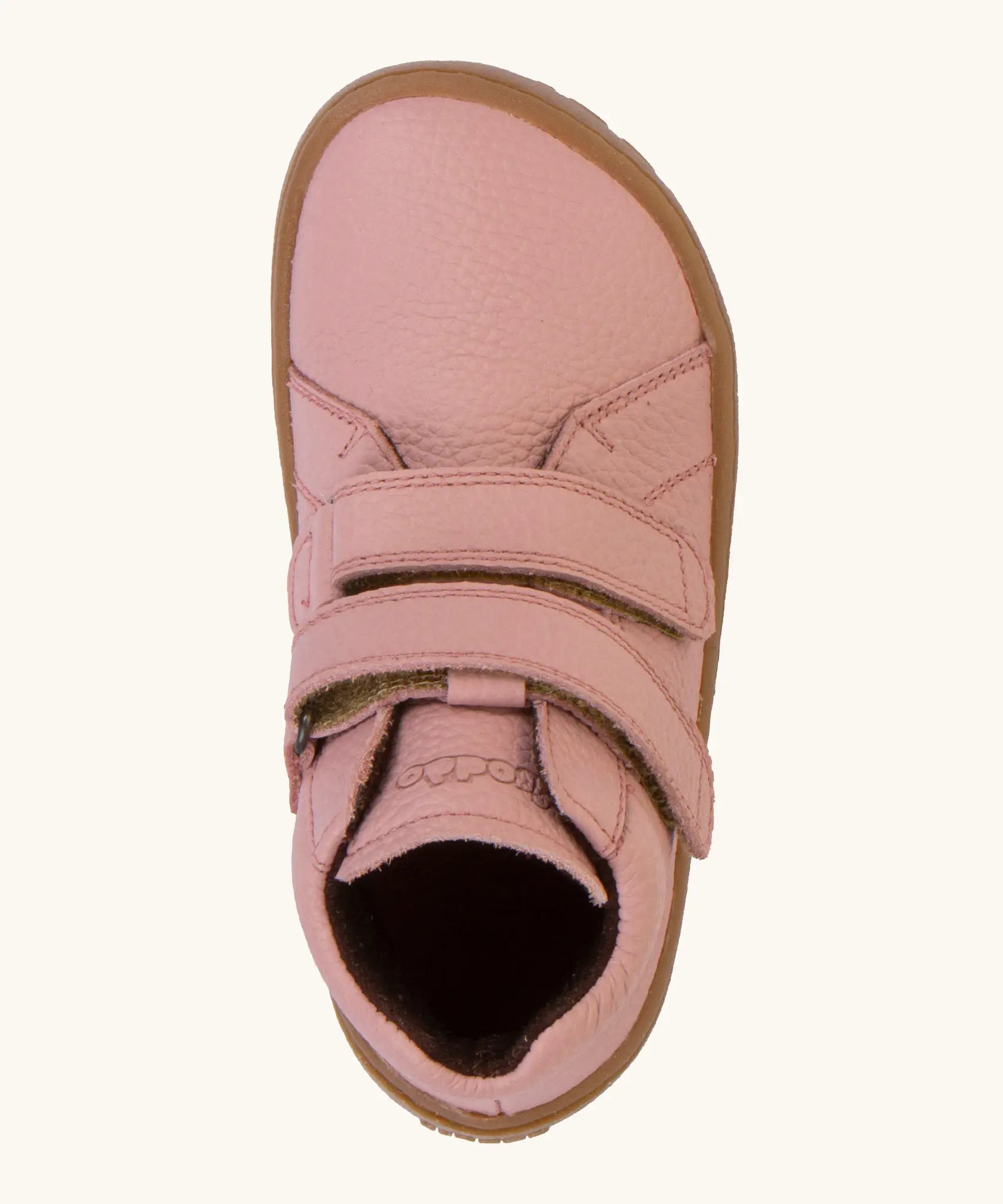 Top view of the Froddo natural leather kids barefoot shoe in pink showing the velcro straps fastened. Shoe has a wide toe box