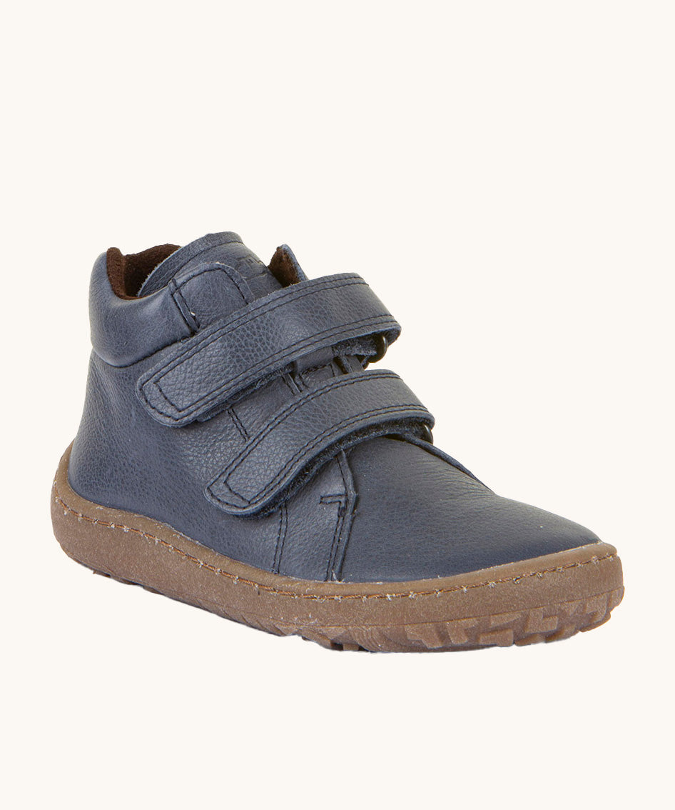 Froddo barefoot Autumn children's shoe in navy available at Babipur. A natural leather shoe with a 2 velcro fastener for a secure fit, padded ankle and a dark brown grippy sole