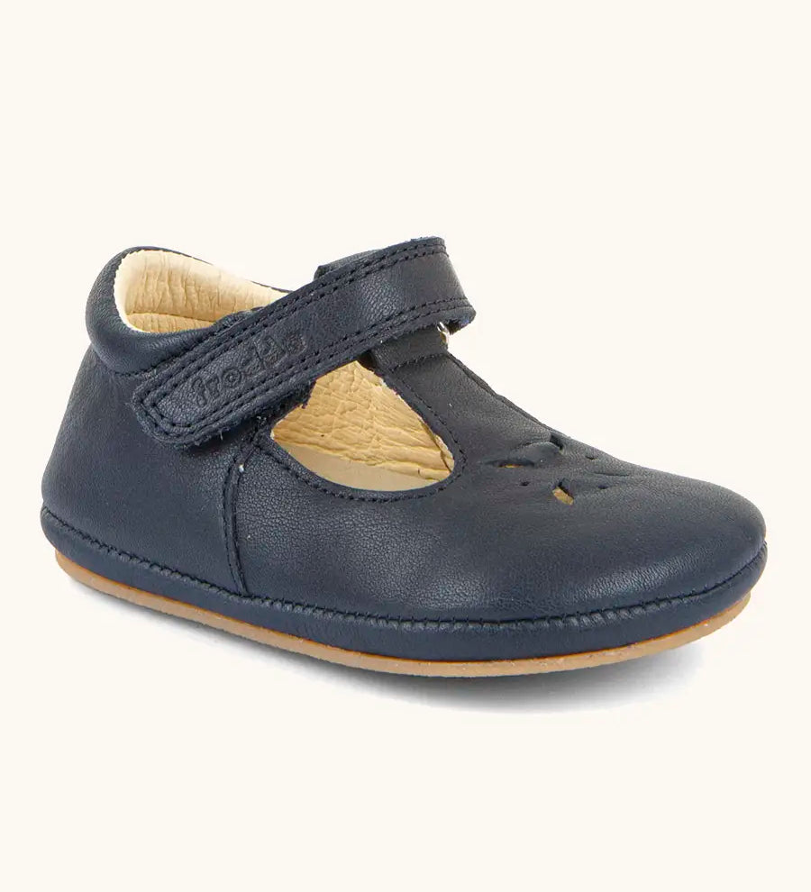 Froddo barefoot pre walker baby shoe in dark blue. A natural leather shoe with a velcro t bar strap