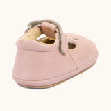 Back of Froddo barefoot walker baby shoe in pink. A natural leather shoe with a velcro t bar strap and padded ankle 
