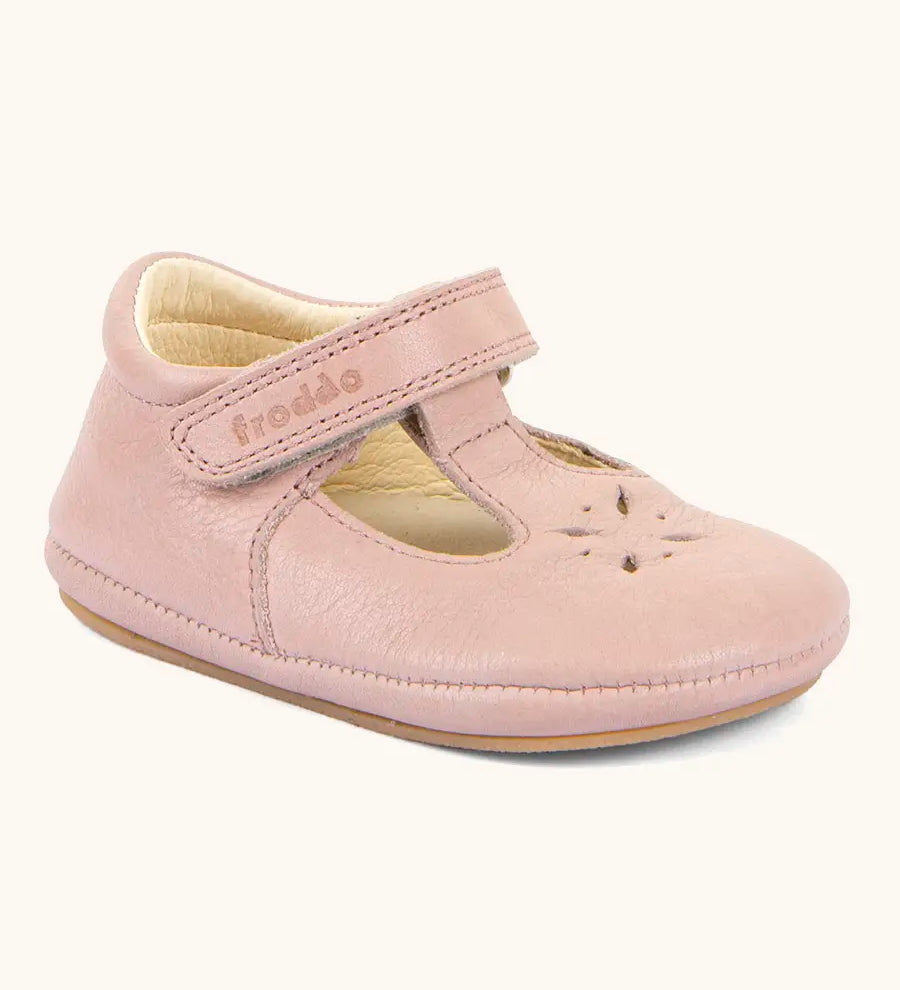Froddo barefoot walker baby shoe in pink A natural leather shoe with a velcro t bar strap and rubber sole