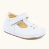 Froddo barefoot pre walker baby shoe in white. A natural leather shoe with a velcro t bar strap