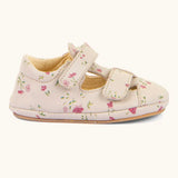 Side of Froddo pink natural leather barefoot pre walker sandal shoe with a repeating floral patterns showing 2 front velcro straps 