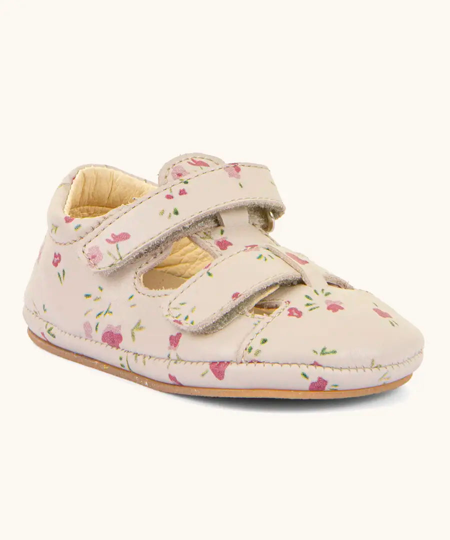 Froddo pink natural leather barefoot pre walker sandal shoe with a repeating floral patterns showing 2 front velcro straps and rubber sole