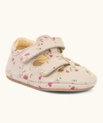 Froddo pink natural leather barefoot pre walker sandal shoe with a repeating floral patterns showing 2 front velcro straps and rubber sole