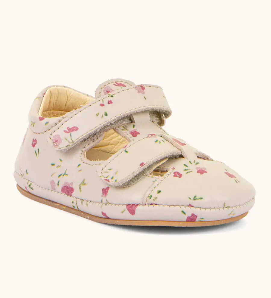 Froddo pink natural leather barefoot pre walker sandal shoe with a repeating floral patterns showing 2 front velcro straps and rubber sole