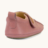 The back of the Froddo barefoot walker baby shoe in dark pink. Showing the pull tab and padded ankle support detail