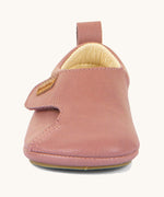 The front of the Froddo barefoot walker baby shoe in dark pink. Showing the velcro strap fastener for a secure fit