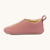 A side image of the Froddo barefoot walker baby shoe in dark pink available at Babipur. Showing the pull tab and padded ankle support detail