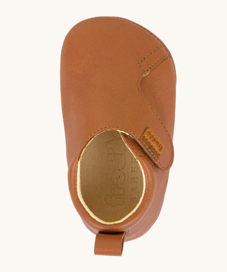 A top down image of the Froddo Barefoot Baby Pre-Walker soft leather Shoes in tan available at Babipur showing the velcro strap and inner sole detail.