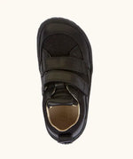 Top view of Froddo barefoot base children's shoe in black showing the velcro strap fastener and insole detail