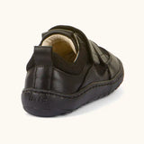 Back of Froddo barefoot low profile children's shoe in black showing 2 padded ankle support and black grip sole